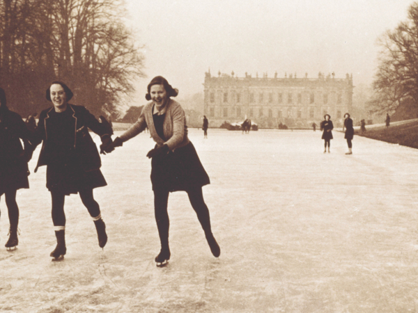 Schoolgirls from Penrhos college ice skating in front of Chatsworth House