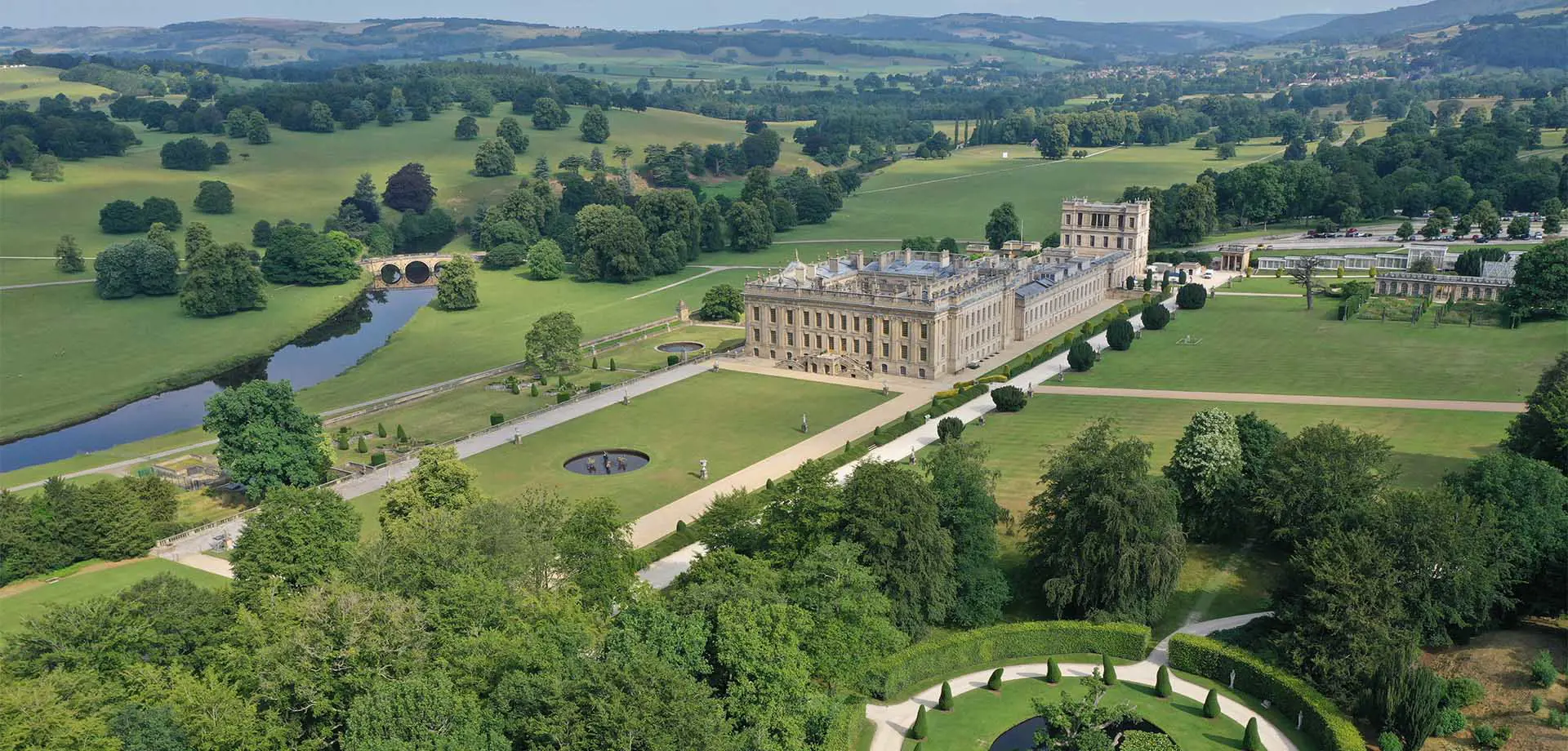 aerial view of Chatsworth showing gardens and parkland